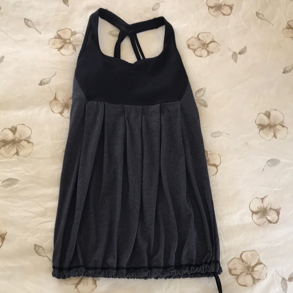 Lululemon size 4 tank with sport bra. Like new